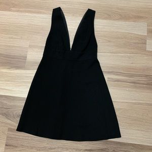 Like new BCBG deep V black mini dress